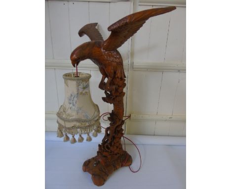 Carved wooden oriental lamp in the form of an eagle in flight approx 24" tall