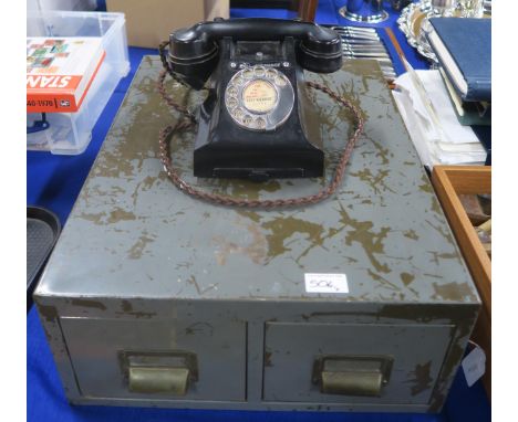 A GPO Call Exchange rotary dial Bakelite telephone, with East Kilbride number; together with a two-drawer steel index cabinet