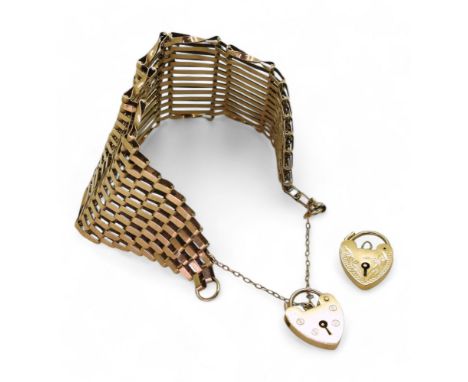 A exceptionally wide gate bracelet, approx 4.2cm, length 17.5cm, together with two 9ct gold heart shaped clasps, weight 25.1g
