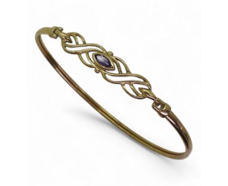 A 9ct gold amethyst bangle, inner diameter 6.5cm, weight 4.7gms Condition Report:Available upon request