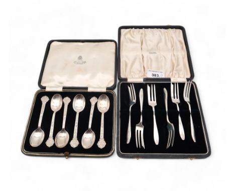 A cased set of Celtic style silver spoons, by Cooper Brothers &amp; Sons, Sheffield 1963, and a set of cake forks, by William