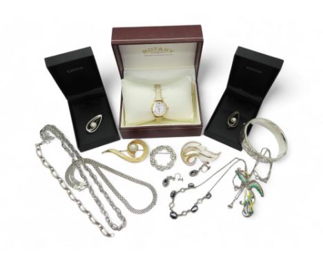 Two silver brooches mounted with synthetic opal marked Ortak with boxes, together with a gold plated Rotary ladies watch and 