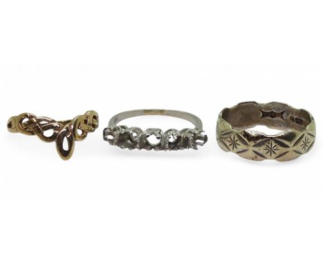 A 9ct white gold wedding ring, hallmarked London 1973, size O, a celtic knot ring, size J, weight together 4.8gms, together w