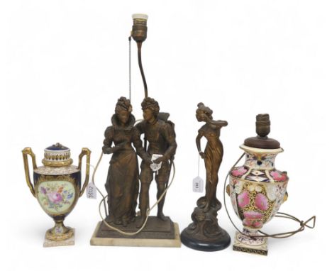 A spelter figure of a maiden, a spelter table lamp modelled as a couple and two ceramic urns Condition Report:Available upon 