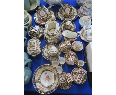 An early Coalport tea service decorated with birds and flowers in a gilt and blue border, pattern number 759, together with R