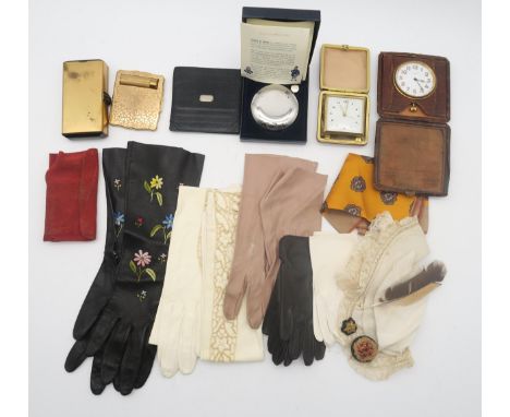 An assortment of ladies' and children's calfskin gloves, to include a floral embroidered elbow-length black pair; together wi