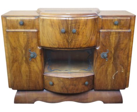 A 20th century Art Deco sideboard/cocktail cabinet with cantilevered two door drinks compartment, 102cm high x 137cm wide x 5