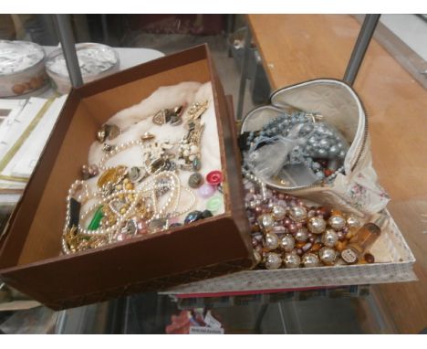 shelf of vintage jewellery