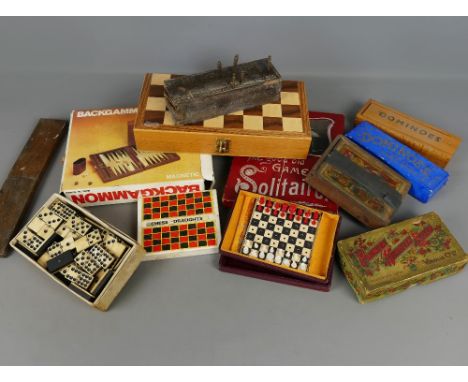 Large box of games, including chess, solitaire, dominoes, backgammon, cribbage, checkers etc