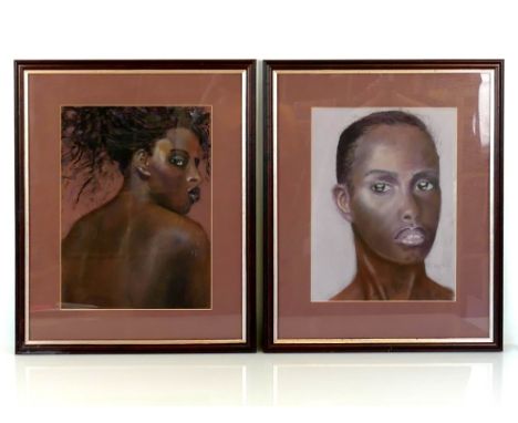 20th Century - pair of well executed pastel works depicting ethnic ladies, 14" x 10.5", framed