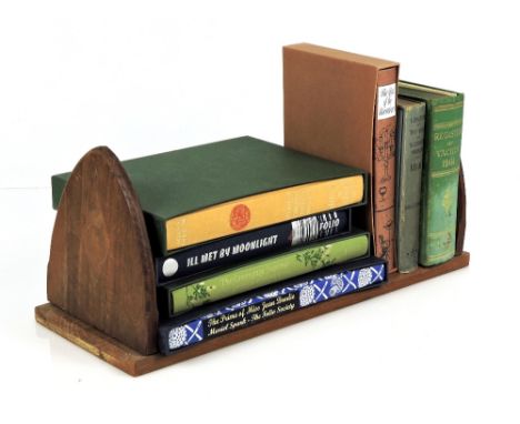 Oak folding book slide, with selection of Folio Society and other vintage books