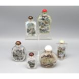 6 diverse Snuffbottles, China, Glas mit farbiger Innenbemalung diverser Ansichten, h 6 bis 10 cm.