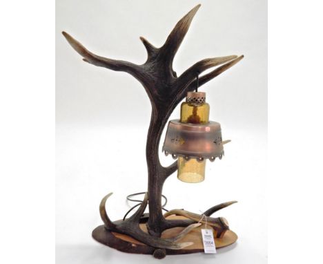 Antler Furniture: A Red Deer Antler Mounted Table Lamp, a large table lamp constructed with antlers, the crackle glazed lamp 