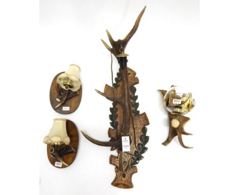 Antler Furniture: Antler Wall Lights, a Red Deer antler mounted wall light, mounted upon a carved Austro German wall shield, 