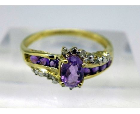 A 9ct gold, diamond and amethyst ring, weight 1.5g, size O