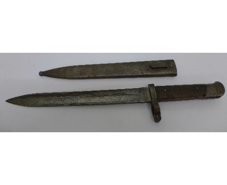 A World War II bayonet with scabbard