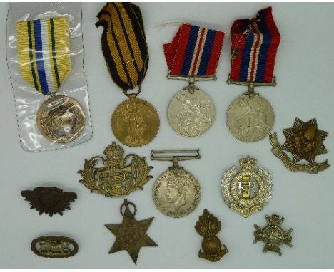 A World War I Victory Medal to 45300 Pte. W. Bowcock Notts and Derby R., and other medals and badges
