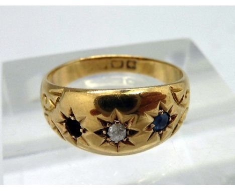 An 18ct gold, diamond and blue stone ring, lacking one stone, weight 2.4g, size J