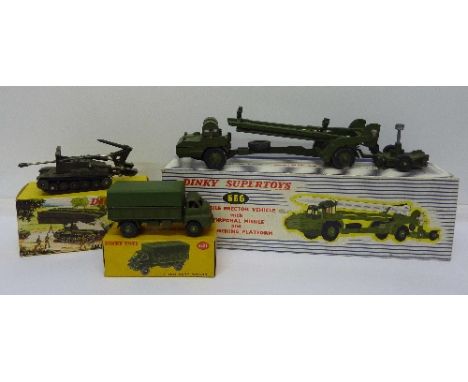 A Dinky Toys 3-ton Army Wagon, 621, boxed, a Dinky Toys 883, incomplete and a Dinky Supertoys 666 missile erector vehicle, in