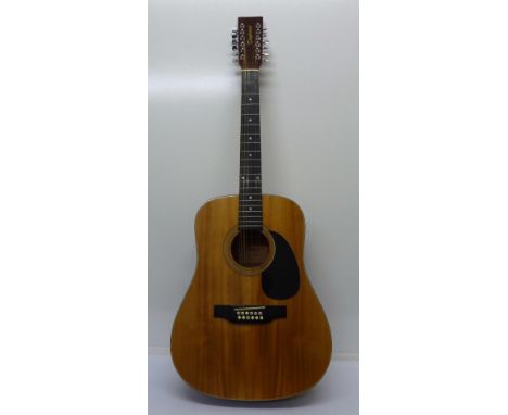 A Tanglewood twelve string acoustic guitar