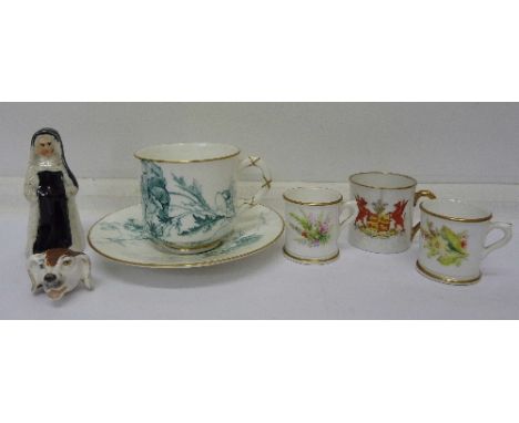 Two Royal Worcester miniature mugs, a Royal Worcester cup and saucer, dog's head whistle, a Staffordshire figure and crested 