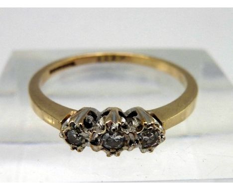 A 9ct gold and three stone diamond ring, weight 1.7g, size O