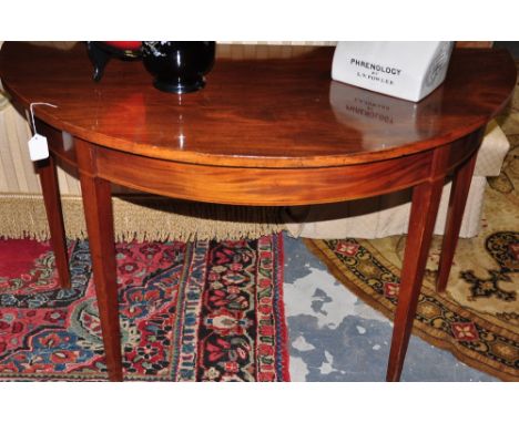 A George III mahogany D shaped console table on square tapered legs, w:120cm