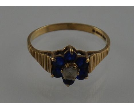 A 9ct gold, diamond and sapphire cluster dress ring