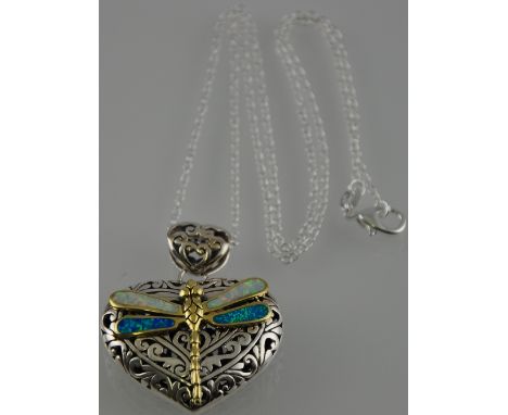 A silver opal and mother of pearl dragon fly necklace