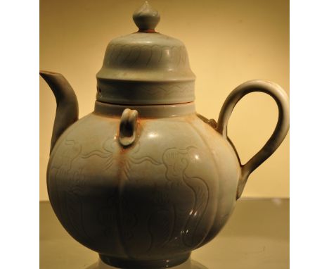 A Chinese light celadon glazed melon shaped teapot, H19.5cm