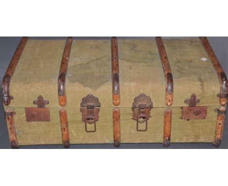 A vintage wood bound canvas covered trunk, W. 84