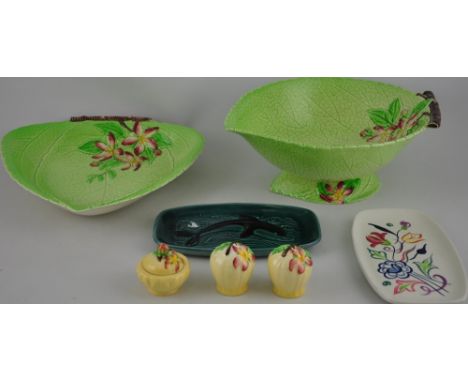 A Carltonware cabbage leaf salad bowl together with a similar triangular dish, a 1930's pottery cruet and two Poole dishes