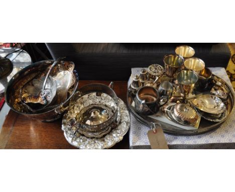 A quantity of plated ware, to include a punch bowl with ladle, two gallery trays and a cruet set with matching posy holder