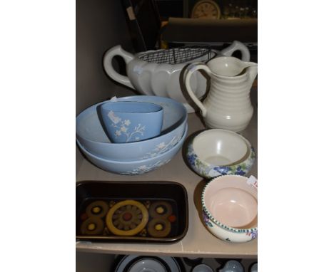 two large Copeland Spode bowls and a small vase in blue with raised white cherry blossom design, a Denby bowl and vase and a 