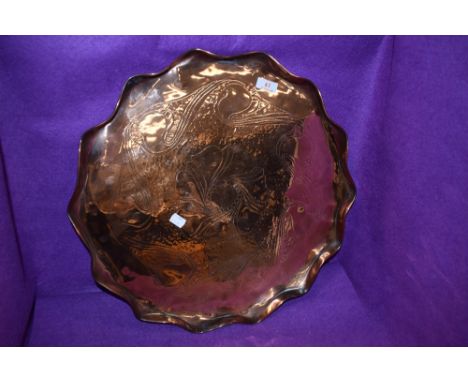 An arts and crafts copper tray having embossed decoration