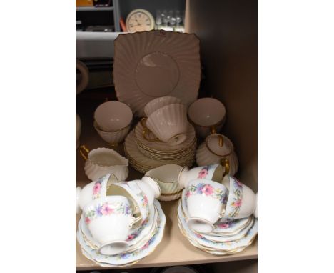 Six Foley cups and saucers and plates having floral transfer pattern and gilt edging, a part Royal Doulton tea service in whi