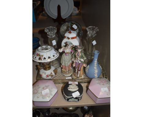 A selection of ceramics including lidded Wedgewood trinket bowl and vase, two figurines, a ceramic oil lamp with floral decor