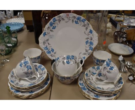 A collection of Royal Albert 'Morning glory' including cups and saucers,jug ,sugar basin and cake plate, around nineteen item