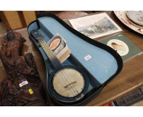 A John Gray &amp; Sons London banjolele in fitted case 