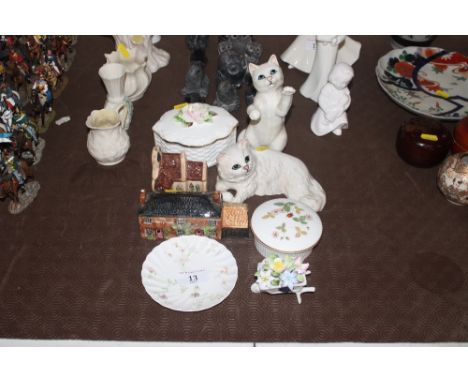 Two Beswick cat ornaments; various porcelain trinket boxes; and other ornaments etc.