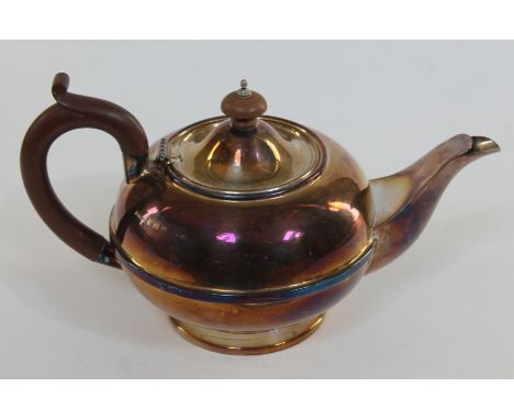 A hallmarked silver teapot, wt. 15oz. 