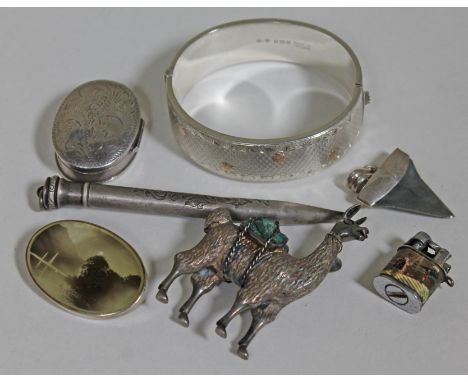 Hallmarked silver comprising a bangle, a pill box and a brooch, and other items including a camel, a propelling pencil, a pen