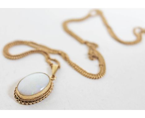 A hallmarked 9ct gold opal pendant on chain marked '375', length 50cm, gross wt. 6.3g.Condition:  Minor chip to rear of stone
