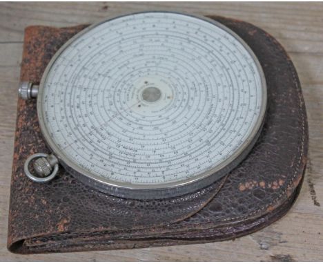 A Fowlers "Magnum" Long Scale Calculator, diam. 12cm, with leather case. 