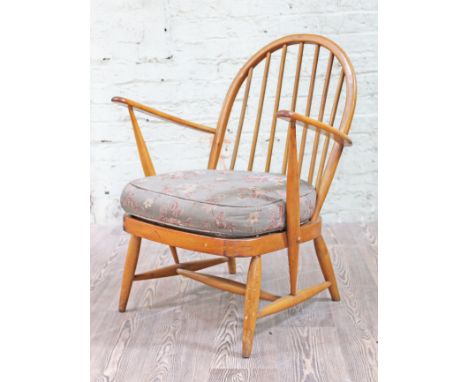 An Ercol blonde lounge chair, width 67cm, depth 67cm & height 80cm. 
