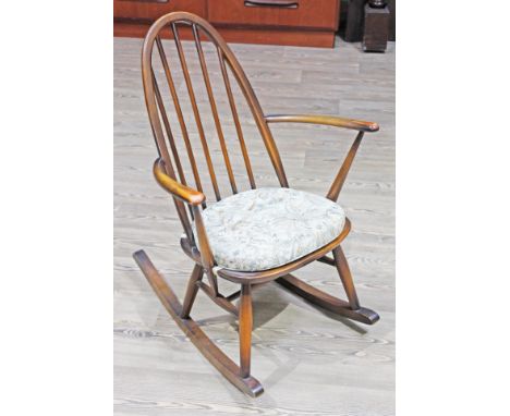An Ercol dark elm and beech rocking chair. 
