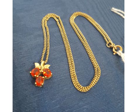 A hallmarked 9ct gold fire opal pendant on hallmarked 9ct gold chain, length 21cm, gross wt. 4g.