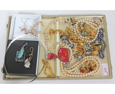 A quantity of costume jewellery including a Scandinavian silver enamel brooch, various pearls, silver jewellery etc. 