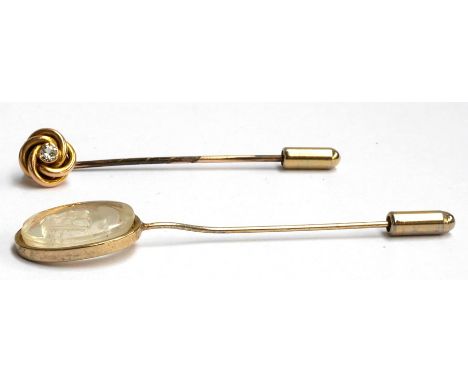 15ct gold stick pin ,weight 2.25g together with one other 