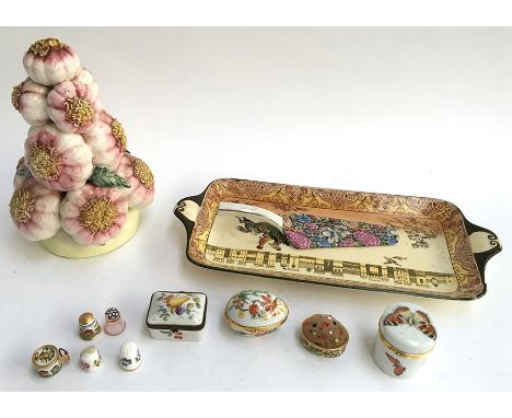 A mixed lot of ceramic items to include several thimbles (one Millefiori), two Limoges trinket dishes with lids, a ceramic bu